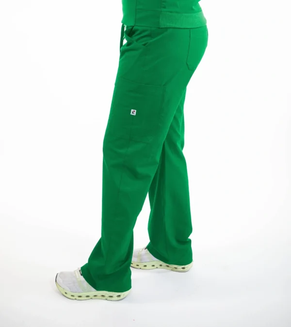 A person wearing green pants and white shoes.